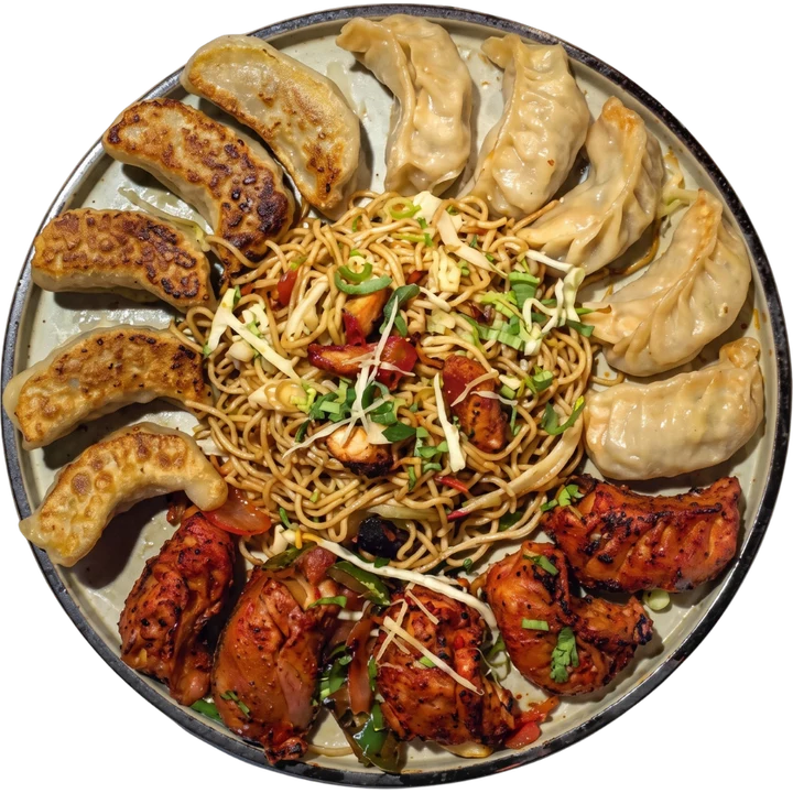 Mixed momo and grilled chicken sharing platter